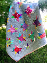 Load image into Gallery viewer, Modern quilt, bright scrappy stars, Gray background.