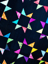 Load image into Gallery viewer, Scrappy Star quilt, bright modern BLACK background