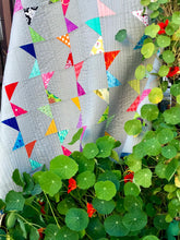 Load image into Gallery viewer, Modern quilt, bright scrappy flags.