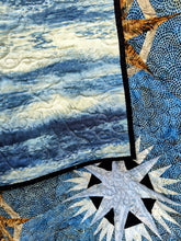 Load image into Gallery viewer, Captains Wheel Batik Quilt.