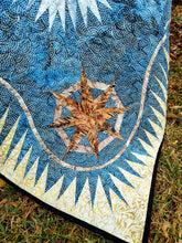 Load image into Gallery viewer, Captains Wheel Batik Quilt.