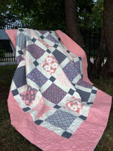 Load image into Gallery viewer, Pink and gray quilt.
