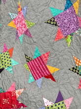 Load image into Gallery viewer, Modern quilt, bright scrappy stars, Gray background.
