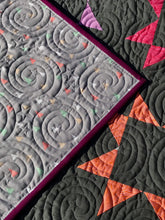 Load image into Gallery viewer, Rainbow stars quilt dark grey background,
