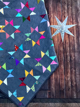 Load image into Gallery viewer, Rainbow stars quilt dark grey background
