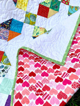 Load image into Gallery viewer, Rainbow scrappy quilt.
