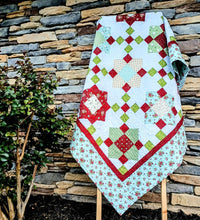 Load image into Gallery viewer, I Believe In Angels; Blue, red and green stars handmade Christmas Quilt.
