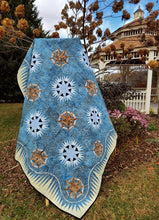 Load image into Gallery viewer, Captains Wheel Batik Quilt.
